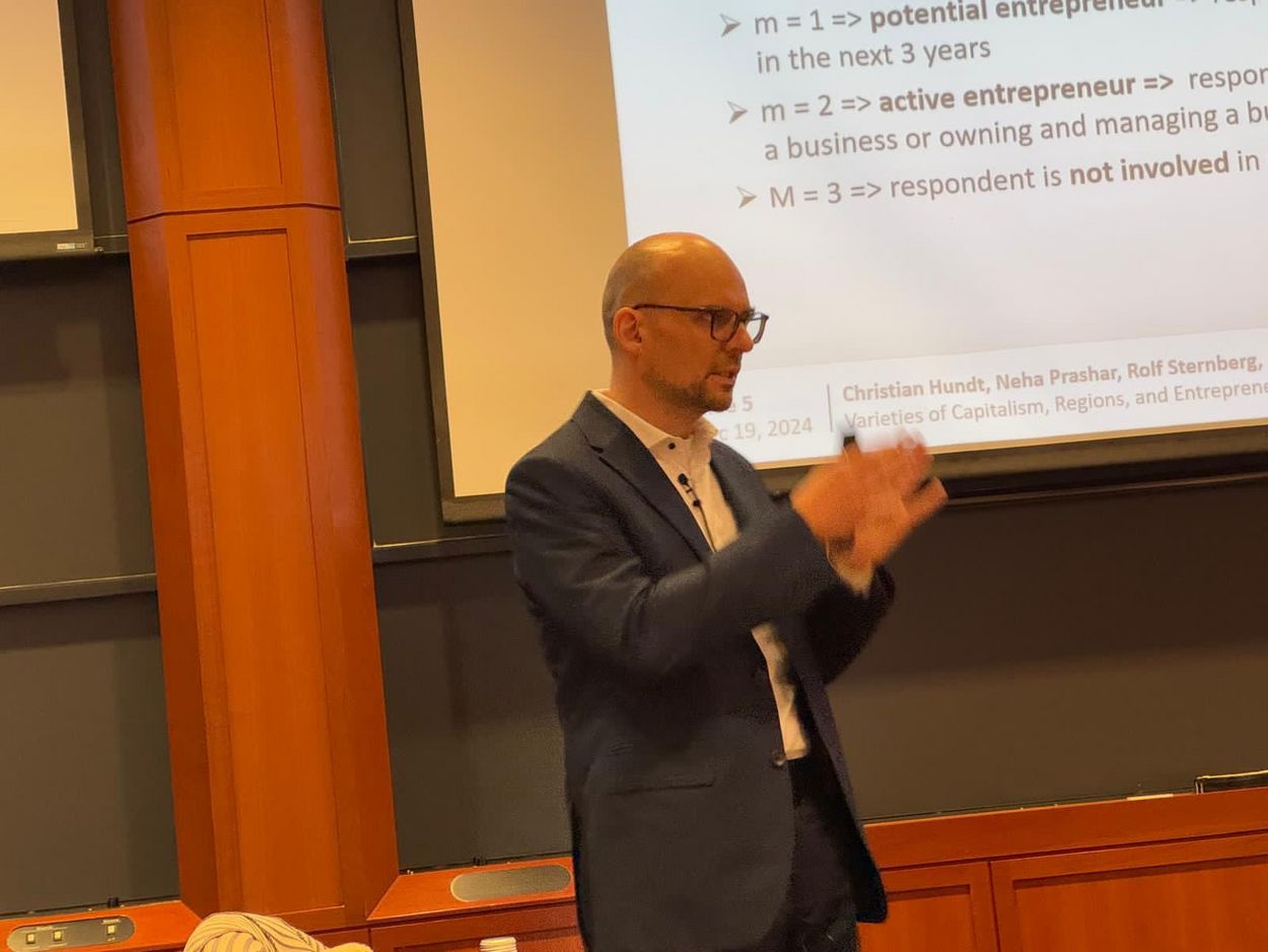 Christian Hundt in the auditorium of Aldrich Hall at Harvard Business School 