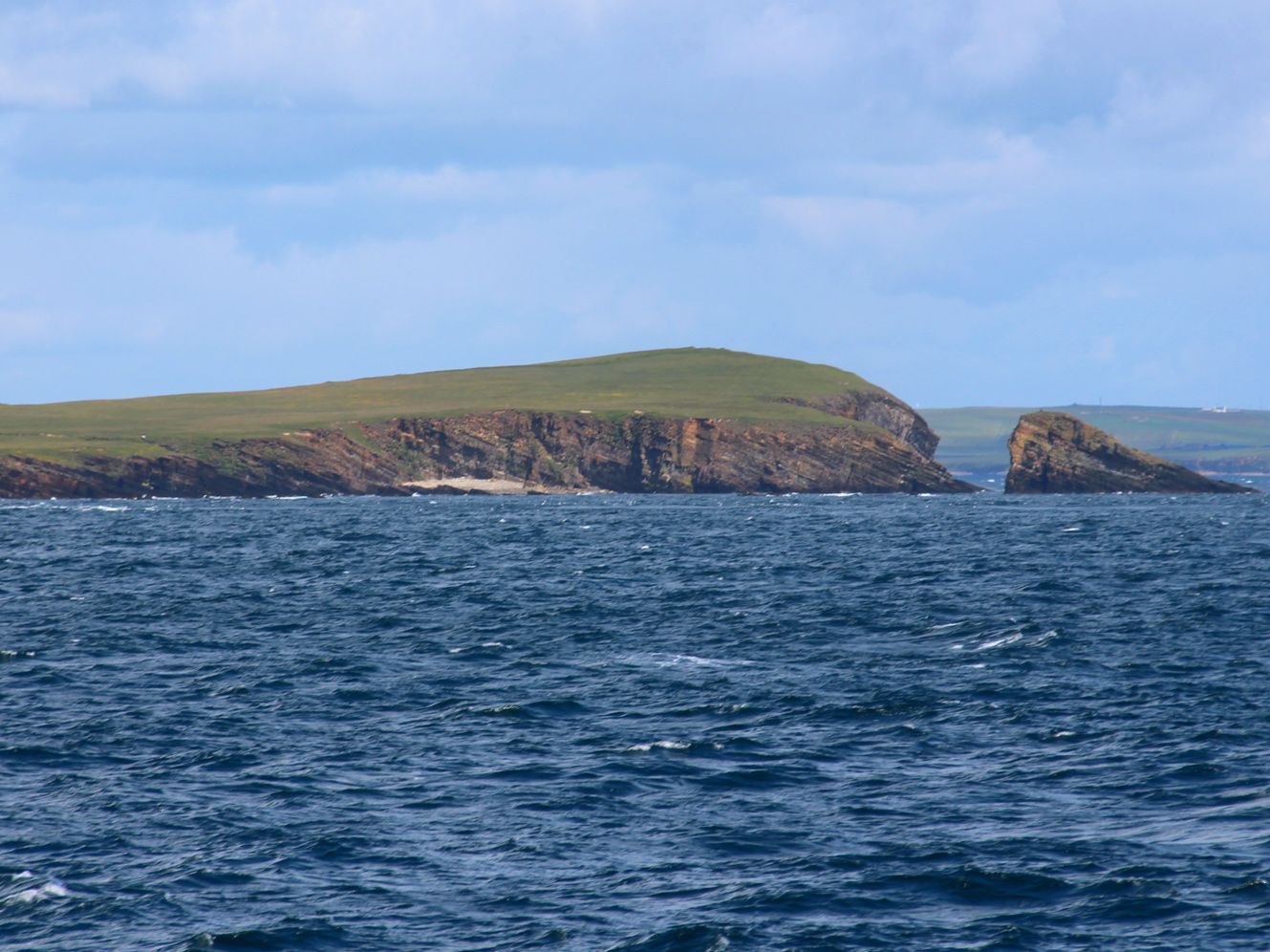 The Pentland Firth is crossed on the outward and return journey.