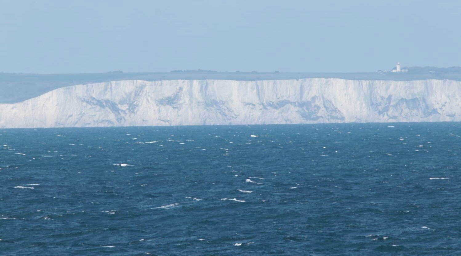 Beautiful view of the white cliffs of Dover during the channel passage. View of the white cliffs of Dover during the channel passage.